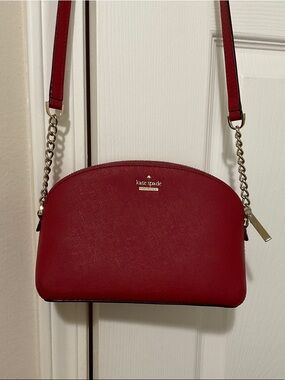 Kate Spade red dome crossbody with gold-tone chain